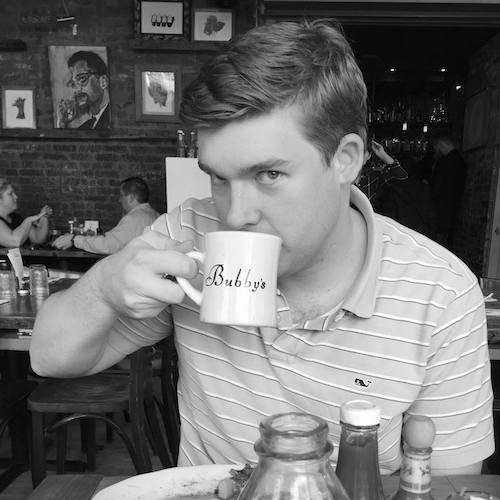 Man being creepy while drinking coffee